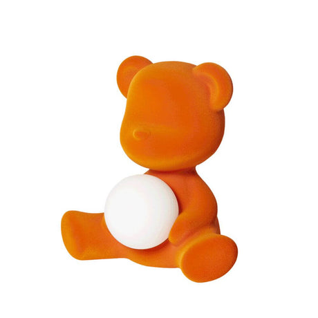 Teddy Girl Velvet Akku Tischleuchte in orange mit leuchtender Kugel, von Stefano Giovannoni entworfen.