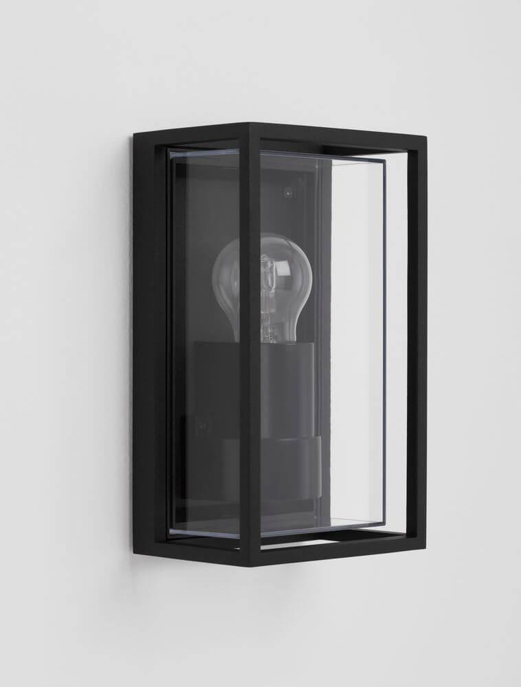 Regina Außenwandleuchte Einfach Verglast E27 Anthrazit IP65 an einer Wand montiert mit klaren Linien und Glasdesign.