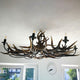 Rothirsch Chalet Geweih Deckenlampe Ø 120cm mit 8-flammigem Kronleuchter für große Räume.