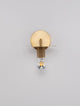 Royal Wandleuchte Ø 12cm mit Abstellfläche E27 in edler Goldoberfläche an Wand montiert.
