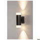 Astina Wandlampe QPAR51 Up & Down Schwarz an einer Wand montiert mit warmem Licht.