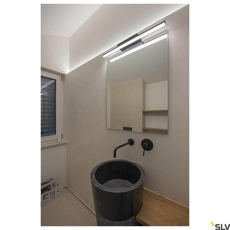Glenos LED CCT spejllys over en elegant håndvask i et moderne badeværelse.