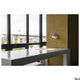 Karpo Magn LED Strahler Wandleuchte an stylischer Wand mit Blick auf Fenster und Platz zum Arbeiten.
