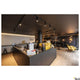 LED Strip 10 24V 80m 3000K im modernen Café mit stylischem Interieur und gemütlicher Atmosphäre.
