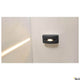 LED Wand- & Deckenaufbauleuchte Out-Beam Frame IP55 an Wand montiert, ideal für Außenbeleuchtung.