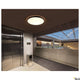 Medo 90 Dali LED Deckenlampe Schwarz 3000 & 4000K in modernem Innenraum mit Aufzug und Beleuchtung.