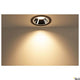 Numinos Diffusor Ellipse in einem modernen Raum, der einen sanften Lichtstrahlen auf die Wand wirft.