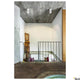 Oculus LED Wand- & Deckenaufbauleuchte Dim-To-Warm in modernem Treppenhaus mit Beton- und Holzelementen