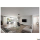 Moderne Wohnraumgestaltung mit der One LED Pendelleuchte Double Phase Up&Down und eleganten Möbeln.