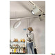 One LED Systemleuchte 3-Phasen Dali Ø 40cm in einem modernen Verkaufsraum mit Schuhen.