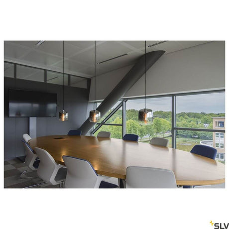 Pantilo 20 pendant lamp E27 chrome in a modern office with large windows and a conference table