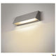 Pema LED Wandaufbauleuchte Outdoor CCT an der Wand installiert und beleuchtet den Raum.
