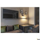 Sedo 7 Wandlampe 3000K Alu in modernem Raum mit Fernseher und stilvollem Mobiliar