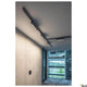 Moderne Raumansicht mit der Sight Move 3-Phasen LED Systemleuchte Dali an der Decke.