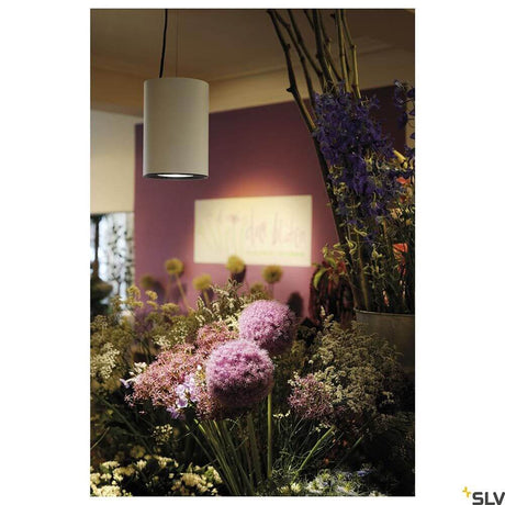 Supros LED Pendellampe als moderne Pendelleuchte über Blumen, helles LED-Licht, ideal für dekorative Innenräume