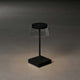 Scilla LED Akku Tischleuchte in schwarz, dimmbar, USB Ladefunktion, IP54, mit 2700 und 3000 Kelvin Lichtfarbe.