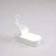 Seletti Daily Glow Sardina LED-Tischleuchte tragbar im Design einer geöffneten Sardinendose.