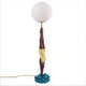 Seletti Lady Diver LED-Tischleuchte dimmbar, detailreiche Taucher-Figur mit gestreiftem Badeanzug, opaken Kugelschirm und blauem Lotus-Sockel