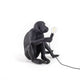 Seletti Monkey Lamp Dekoleuchte Outdoor sitzend Schwarz sitzender Affe Lampe mit Glühbirne, dekorative Outdoor-Dekoleuchte von Marcantonio