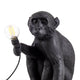 Seletti Monkey Lamp Dekoleuchte Outdoor sitzend Schwarz sitzender Affe mit Glühbirne, Outdoor-Dekoleuchte von Marcantonio Raimondi Malerba
