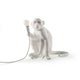 Seletti Monkey table lamp sitting white