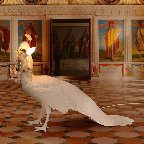 Seletti Peacock floor lamp White dimmable in a stylish room with artistic wall murals.