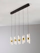 Seneca LED Pendelleuchte Balken 82cm 5-flammig 3000K Schwarz, Gold - elegantes Design mit Matt-Schwarz und Gold-Akzenten.