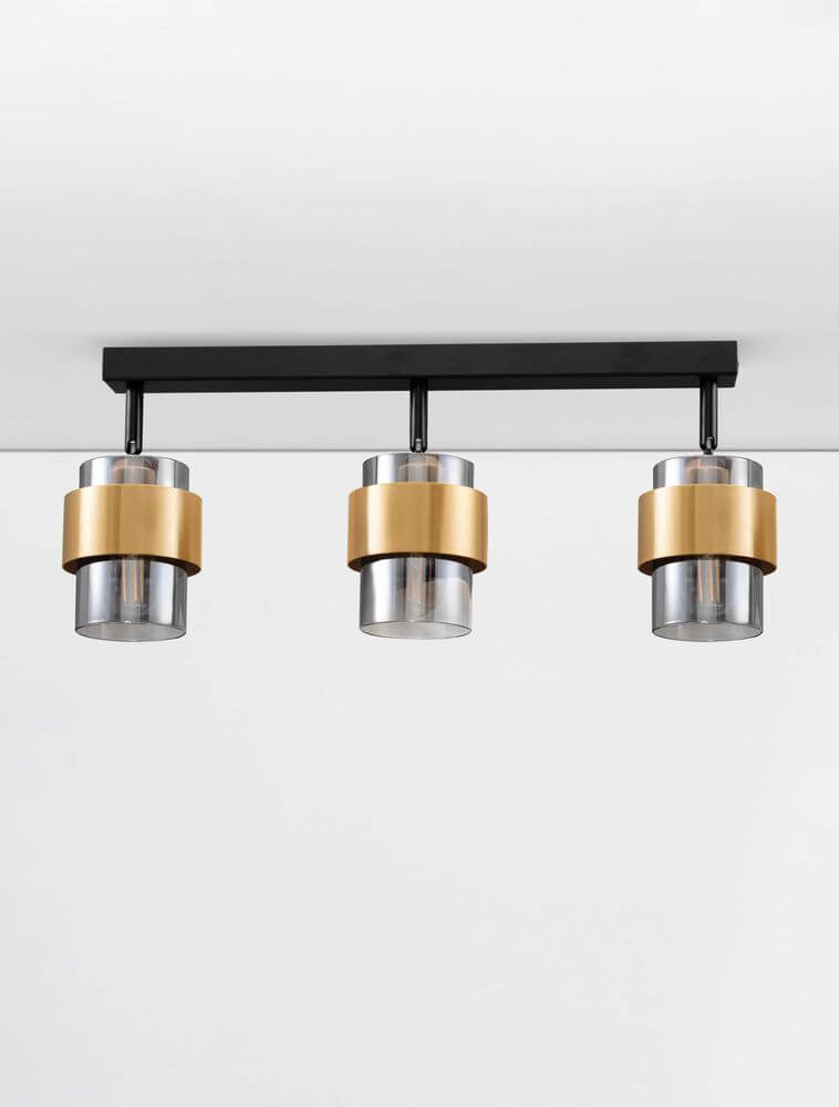 Sianna Deckenleuchte Balken 70cm 3-flammig Schwarz, Gold mit retro Stil und beeindruckenden Lichteffekten.