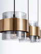 Sianna Pendelleuchte Balken 70cm 3-flammig Gold, Rauch, Schwarz mit goldenem Metallring und rauchigem Glaszylinder.