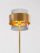 Sianna Stehlampe Gold, Rauch, Schwarz: elegante Stehleuchte mit mattschwarzem Metall und rauchfarbenem Glas.