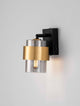 Sianna Wandleuchte E27 Schwenkbar Schwarz, Gold an der Wand installiert, Retro-Design mit beeindruckenden Lichteffekten.