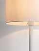 Alt Tag: Sibnia Tischleuchte E27 Ø 30cm - elegante schwarze Tischlampe mit goldenen Details, heller Stoffschirm, stimmungsvolle Beleuchtung für Wohnzimmer