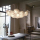 Slamp taklampe Veli 7 hvit i et moderne rom med elegant design og diffust lys.