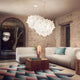 Slamp Pendelleuchte Veli Foliage Weiß im modernen Wohnzimmer mit skandinavischer Einrichtung