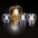 Slamp LED Hängelampe Aria Large 7000lm 2700K Transparent in modernem Design mit goldenen und transparenten Elementen.