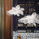 Slamp LED Hängelampe La Belle Etoile in elegantem Design über einer Bar