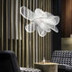 Slamp LED Hängelampe La Belle Etoile in modernem Wohnambiente mit eleganter Einrichtung.