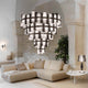 Slamp LED Hängeleuchte La Lollona 5 Ø 130cm im modernen Wohnraum mit stilvollem Sofa und eleganter Dekoration.