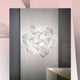Slamp La Belle Étoile LED-Wand- & Deckenleuchte in modernem Design mit schillerndem Licht.