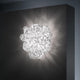 Slamp Wand- & Deckenlampe Drusa Weiß an der Wand, strahlendes Licht und zeitgenössisches Design.