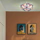 Slamp Wand- & Deckenleuchte La Vie Effektlampe an der Decke in einem stilvollen Raum mit Kunstwerken.