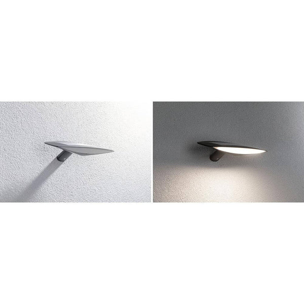 Solar LED Außenwandleuchte Kiran Bewegungssensor Anthrazit an Wand montiert, tagsüber und nachts beleuchtet.