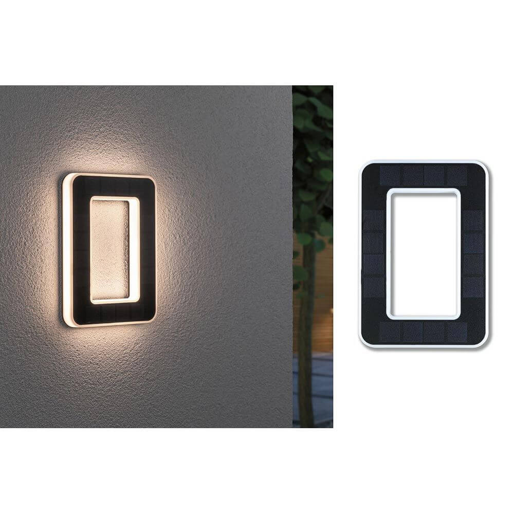 Solar LED Hausnummernleuchte Nummer 0 an der Wand montiert mit warmweißem Licht und Solarpanel.