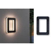 Solar LED Hausnummernleuchte Nummer 0 an der Wand montiert mit warmweißem Licht und Solarpanel.