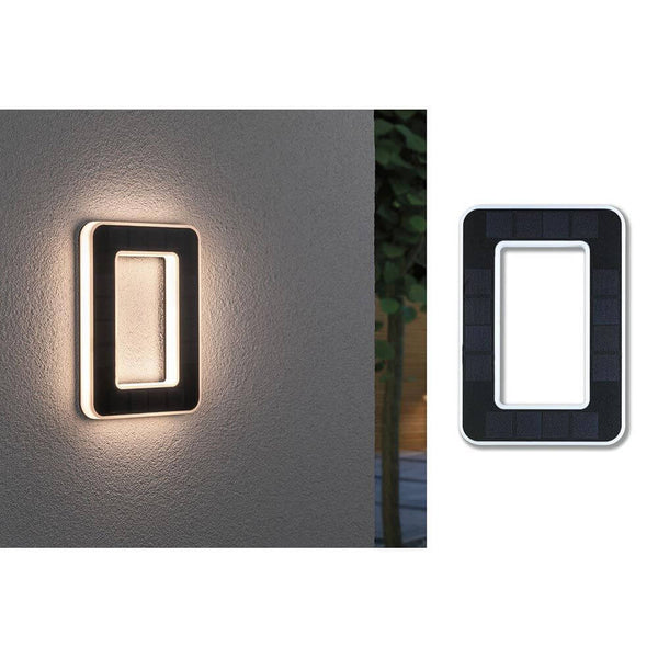 Solar LED Hausnummernleuchte Nummer 0 an der Wand montiert mit warmweißem Licht und Solarpanel.