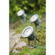 Special Line Garden Spot Light IP65 max. 1x28W GU10 Alu auf einem Gartenweg zwischen Pflanzen.