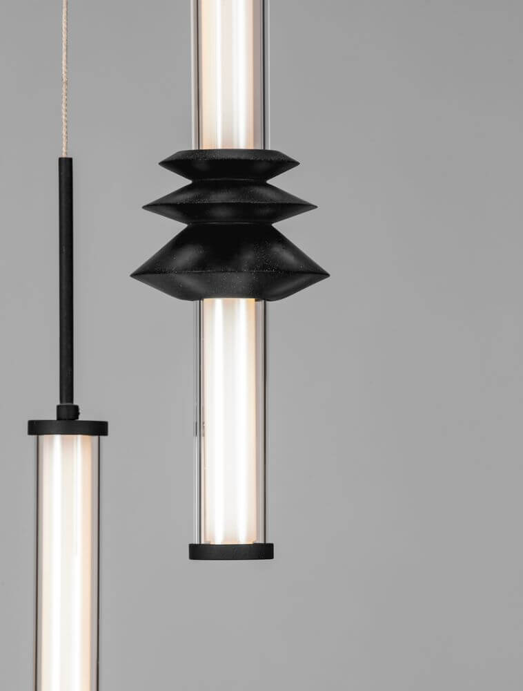 Stalactite Pendelleuchte 5-flammig in Schwarz mit eleganten Designelementen und warmem Licht bei 3000K.