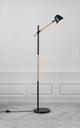 Stehlampe Theo mit Holz- und Metallelementen, verstellbarem Lampenkopf für modernes Wohndesign.