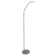 LED-Stehleuchte Zenith 2200-4000K in modernem Design, ideal für wohnliche Beleuchtung und gemütliches Lesen.