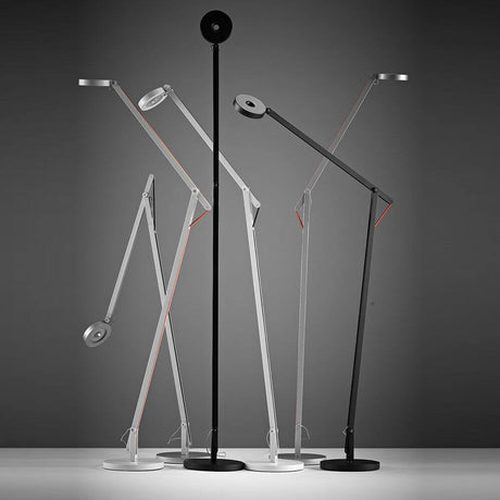Rotaliana String LED floor lamp with Push Dimm to Warm Silver in an elegant, flexible positioning against a neutral background.